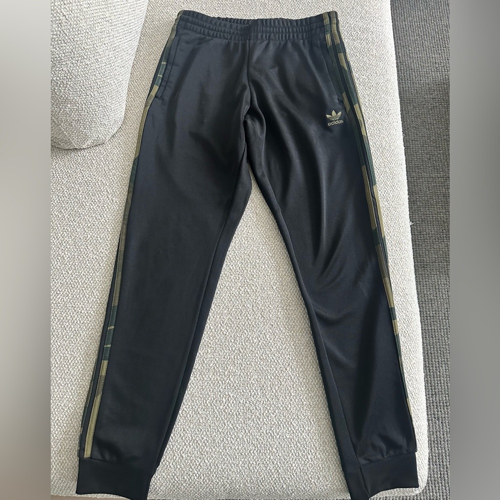 Adidas black track pants with camo pattern